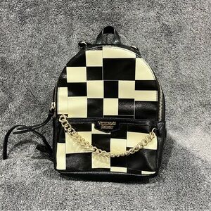 Victoria's Secret small city backpack with a black and white checkered pattern